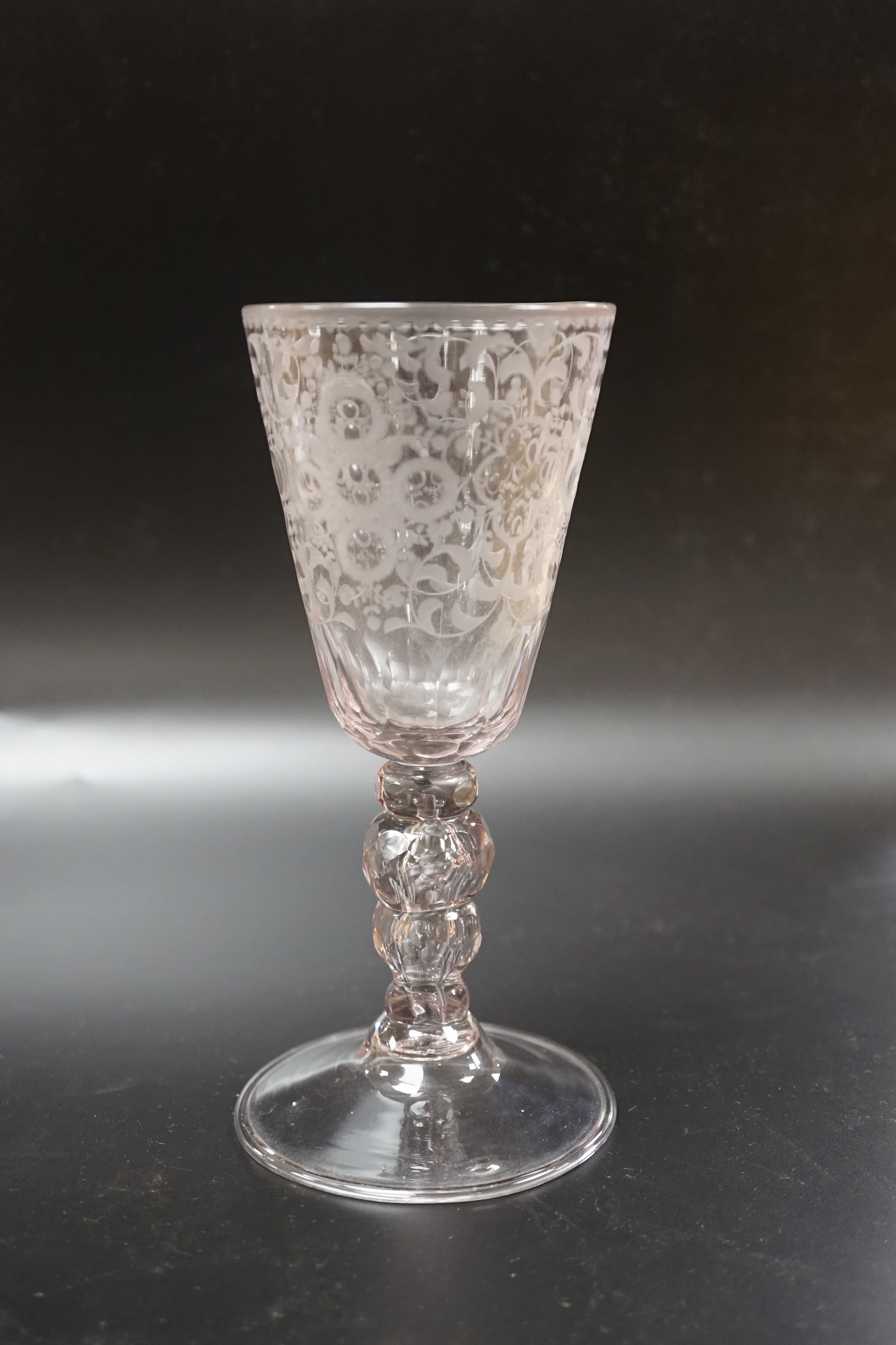 A late 18th century Dutch wheel engraved conical bowl glass goblet, 19cm